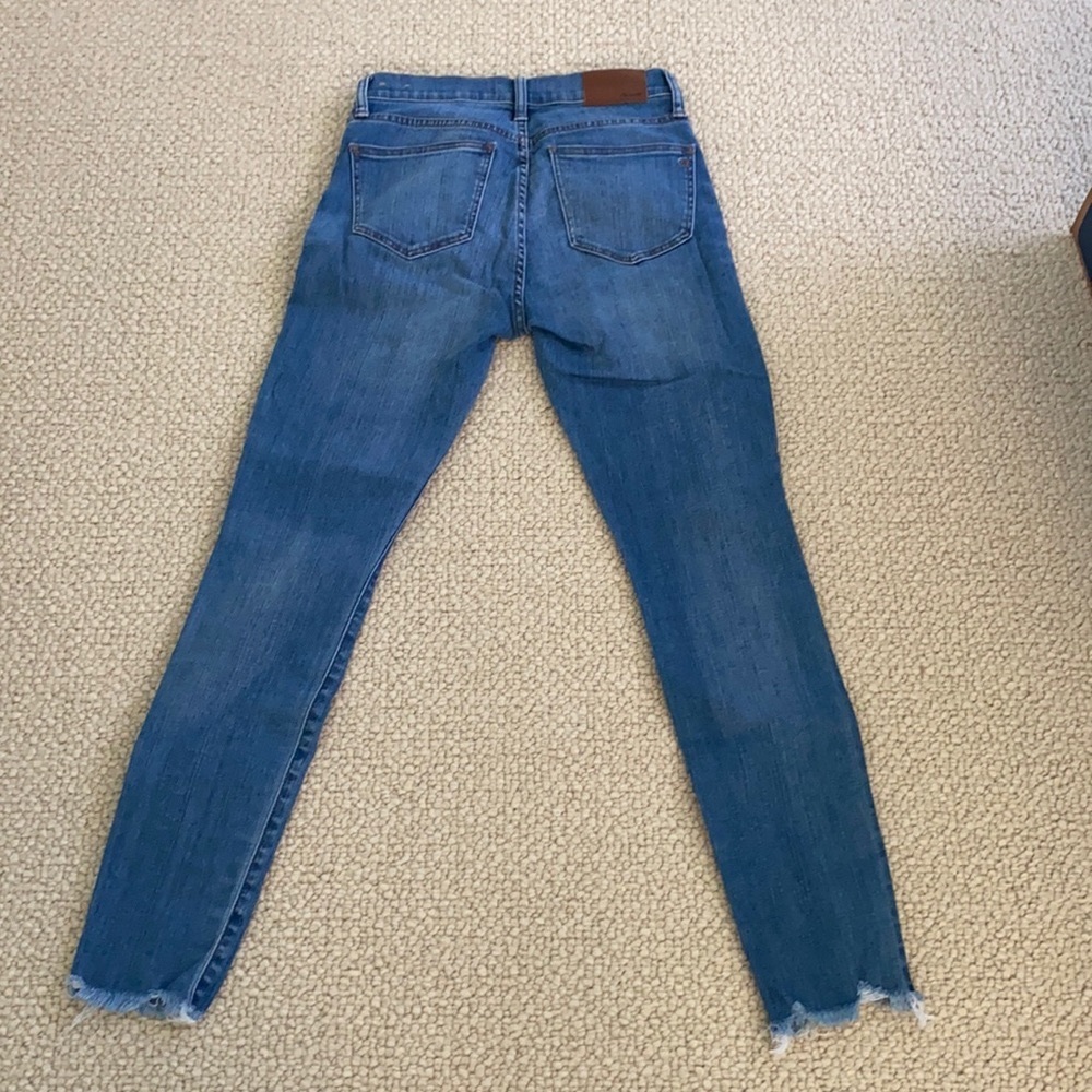 Madewell high rise skinny leg jeans.